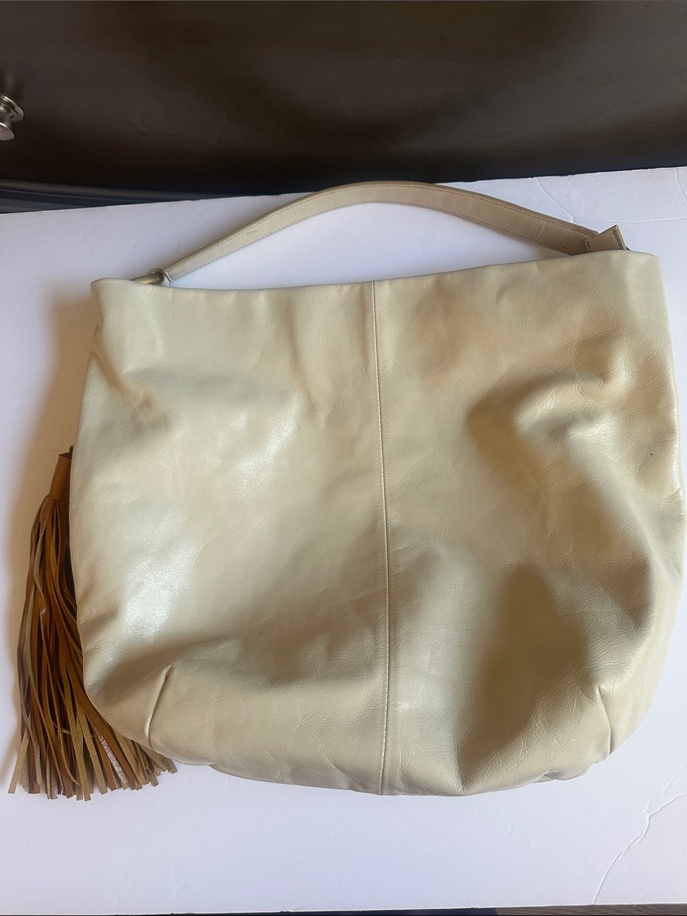 HOBO Cream Leather Hobo with Tassel Accent - Picture 5 of 9